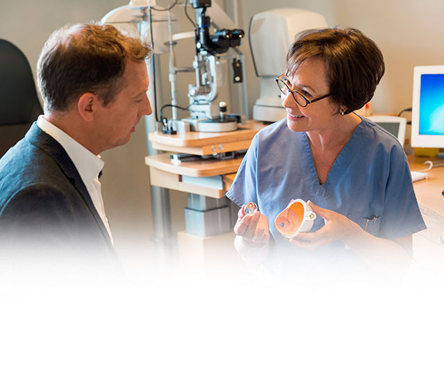 A female doctor explains a procedure to a patient